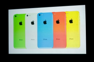 The five colors of the new iPhone 5C are seen on screen at Apple Inc's media event in Cupertino